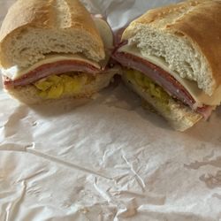 Caprara Bakery - Great sandwich! The meats and flavor of peppers and dressing is good. The bread on top is tough and chewy, which I like. The price was 6.95.