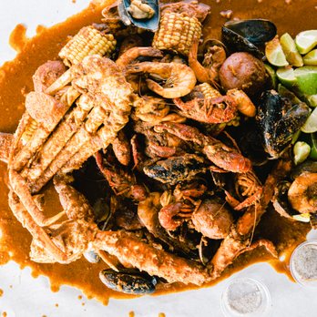 Crab Pub - a plate of seafood and vegetables - Seafood Near Me - Oceanside, California