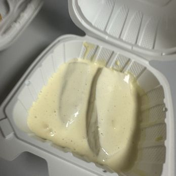 El Hatuchay - Boiled potato with creamy sauce on top - Peruvian Near Me - North Hollywood, California