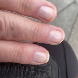 Nails - Rough red skin and didn't clean under the nails. Rubbed lotion on with dust from filing. Awful!