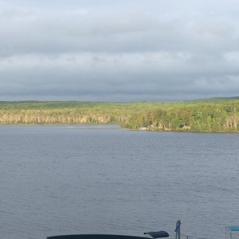 Superior Times Resort and Campground - View of the dock and Au Train lake - Resorts Near Me - Autrain, Michigan