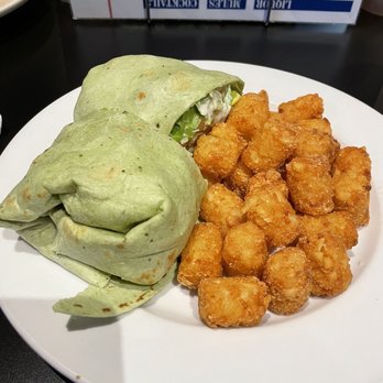 Tanner's Bar and Grill - caesar spinach wrap w/ tots - Sports Bars Near Me - Middleton, Wisconsin Tanner's Bar and Grill - caesar spinach wrap w/ tots - Sports Bars Near Me - Middleton, Wisconsin