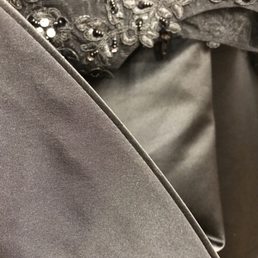 Seamless hemming on an evening gown.