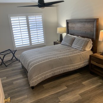 B&B Flooring Contractors - a bed in a bedroom - Flooring Near Me - La Quinta, California B&B Flooring Contractors - a bed in a bedroom - Flooring Near Me - La Quinta, California