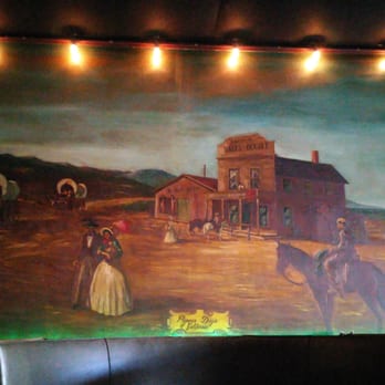 Daley Double Saloon - a painting of a woman and a horse - Dive Bars Near Me - Encinitas, California