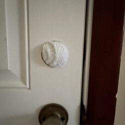 Lowe's Home Improvement - Notice the white towel where the dead bolt should go!!
