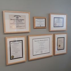 Beach City Dental - Wall of diplomas...