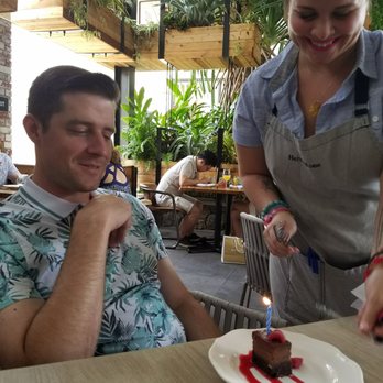 Herringbone Waikiki - Birthday boy and raspberry chocolate torte - Seafood Near Me - Honolulu, Hawaii