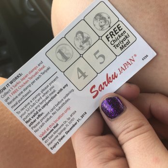 Sarku Japan - a woman holding a ticket for a free lunch - Japanese Near Me - Altamonte Springs, Florida Sarku Japan - a woman holding a ticket for a free lunch - Japanese Near Me - Altamonte Springs, Florida