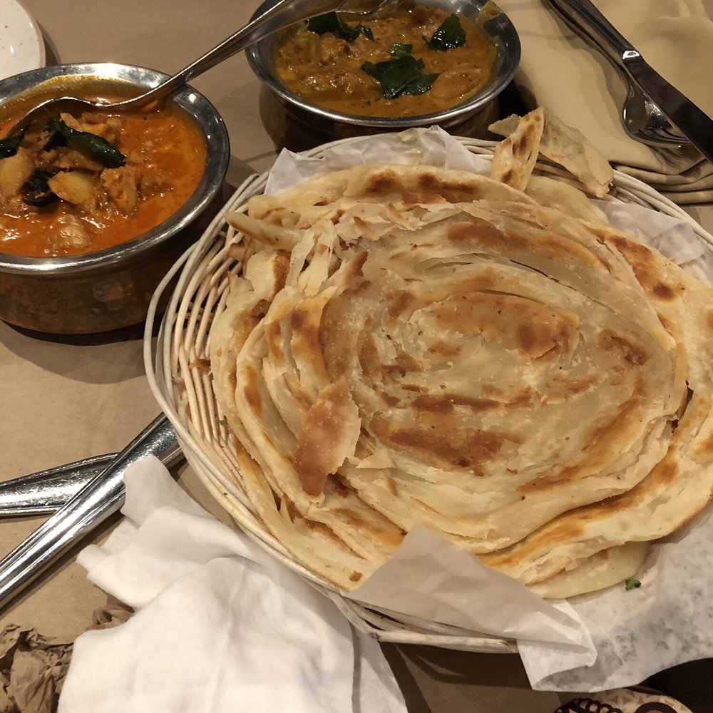 Coconut Lagoon - Fish curry, coconut chicken curry and porantha. - Indian Near Me - Ottawa, Ontario Coconut Lagoon - Fish curry, coconut chicken curry and porantha. - Indian Near Me - Ottawa, Ontario