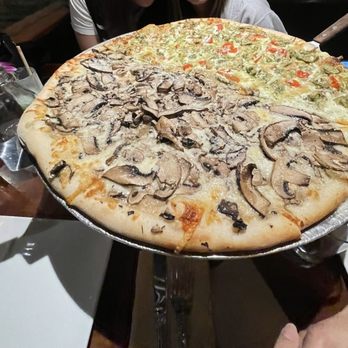 Rocco's - Fungi and Chicken Pesto Pizza half and half. Amazing - Bars Near Me - Seattle, Washington Rocco's - Fungi and Chicken Pesto Pizza half and half. Amazing - Bars Near Me - Seattle, Washington