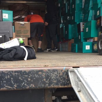 College Muscle Movers - Anthony and Sam rearranging boxes in my rental truck. Sorry about the unflattering view, Sam! - Movers Near Me - Saint Paul, Minnesota