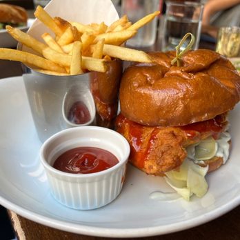Haven Craft Kitchen + Bar - fried jidori chicken sandwich: pt. reyes blue cheese dressing, maple hot sauce + kohlrabi & apple slaw = $19 - New American Near Me - Orange, California
