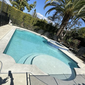 Waterfall Pools - Pool with Baja shelf. - Pool & Hot Tub Service Near Me Waterfall Pools - Pool with Baja shelf. - Pool & Hot Tub Service Near Me