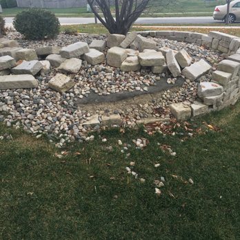 Blade Cutters - a circular rock garden in a residential neighborhood - Landscaping Near Me - Crown Point, Indiana