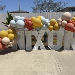 Wee Gather - Marquee letters in the back patio paired perfectly with a balloon garland