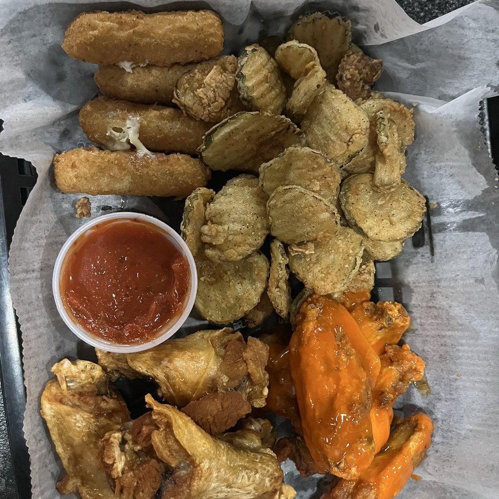 1836  Desoto - Appetizer platter with fried pickles, wings and mozzarella sticks - American Near Me - Olive Branch, Mississippi