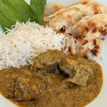 GumaGumalu - Gongura Goat Curry. Gongura leaves add a nice tangy flavor that pairs well with the heat. - Indian Near Me - Fremont, California GumaGumalu - Gongura Goat Curry. Gongura leaves add a nice tangy flavor that pairs well with the heat. - Indian Near Me - Fremont, California
