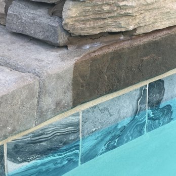 Clean N Blue Pool Solutions  - Their approved solution to apply sealant to stop rusting. Note how you have bare concrete and then eye popping maple glaze. - Pool Cleaners Near Me