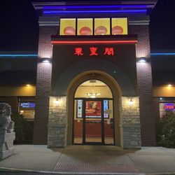 Crazy Buffet - View of restaurant entrance at night. Sept 2024.