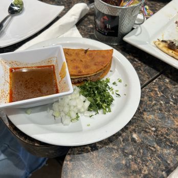 Sazon It Mexican Grill - Quesabirria with broth doesn't disappoint. Highly recommend it! - New Mexican Cuisine Near Me - Rialto, California Sazon It Mexican Grill - Quesabirria with broth doesn't disappoint. Highly recommend it! - New Mexican Cuisine Near Me - Rialto, California
