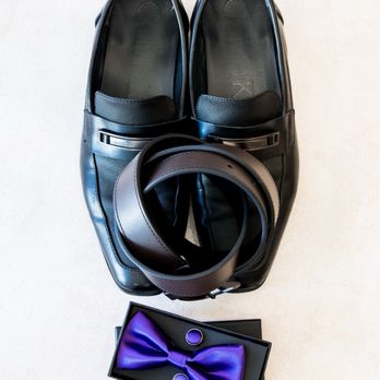Judy and Gavin Photography - Photo of groom's accessories - Videographers Near Me Judy and Gavin Photography - Photo of groom's accessories - Videographers Near Me