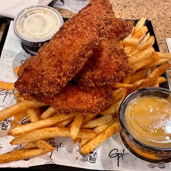 Guy Fieri's Kitchen+Bar Express - Chicken tenders and fries - New American Near Me - Burbank, California Guy Fieri's Kitchen+Bar Express - Chicken tenders and fries - New American Near Me - Burbank, California