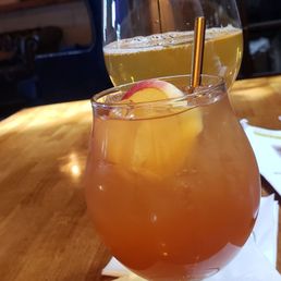 A Roll in the Hay Cider and Peach Heimat cocktail and Orchard Hill Bitters and Sharps Cider. A Roll in the Hay Cider and Peach Heimat cocktail and Orchard Hill Bitters and Sharps Cider.