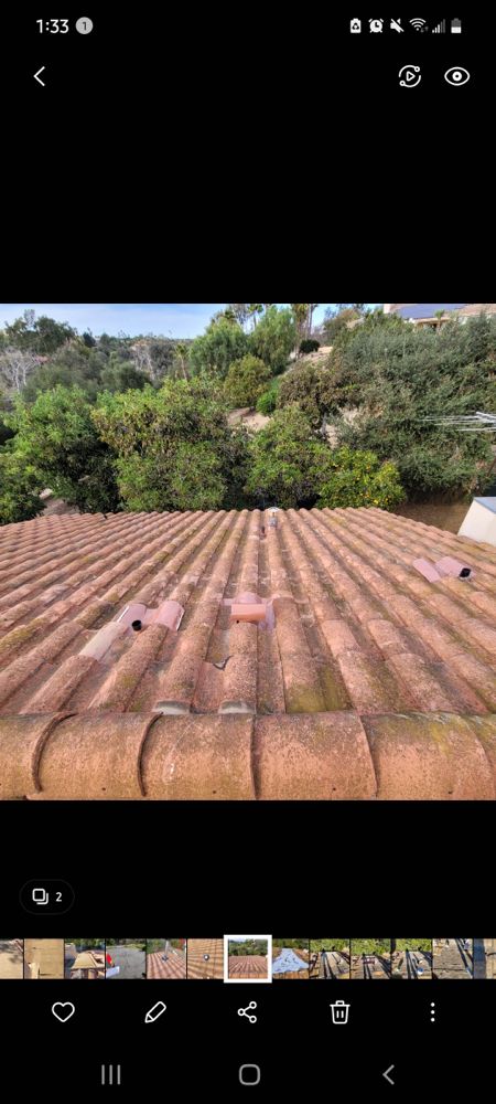 Slide of Courtesy Roofing Services