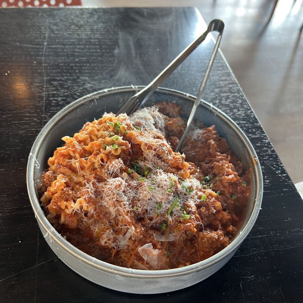 Seville Chicago - Wagyu Bolognese- mafaldine, rioja short rib ragu, Parmesan and chives $27 - Spanish Near Me - Chicago, Illinois Seville Chicago - Wagyu Bolognese- mafaldine, rioja short rib ragu, Parmesan and chives $27 - Spanish Near Me - Chicago, Illinois