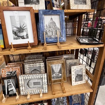 World Market - a display of framed and unframed photographs - Home Decor Near Me - Sherman Oaks, California World Market - a display of framed and unframed photographs - Home Decor Near Me - Sherman Oaks, California