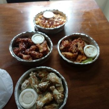 Dew Drop Inn - Right to left....Cajun Garlic Bacon, Wasabi Ranch, Montreal Butter BBQ and Cheesy Bacon Tots.  Absolutely Delicious. - Bars Near Me - Derby, Connecticut