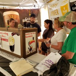 Participants in the VIP area learn how to pour the Perfect Pint of Guinness from our local Guinness rep.