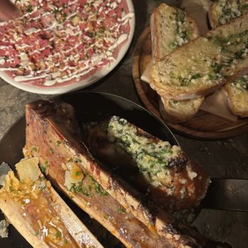 Red Ash - Thin-Sliced Beef Carpaccio Wood-Roasted Beef Bone Marrow - Italian Near Me - Austin, Texas Red Ash - Thin-Sliced Beef Carpaccio Wood-Roasted Beef Bone Marrow - Italian Near Me - Austin, Texas