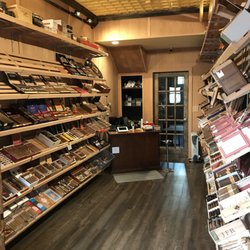 The Smoking Dog - Walk-in humidor looking towards back of store.
