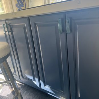 Cleveland Family Builders - a kitchen with blue cabinets - General Contractors Near Me Cleveland Family Builders - a kitchen with blue cabinets - General Contractors Near Me