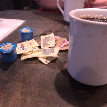 This is the coffee and creamer put in front of us. 2 vanilla creamers, no plain creamer or milk..and Splenda (which I asked for) but no reg.