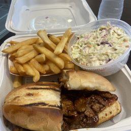 Tri-tip sandwich, fries, and coleslaw Tri-tip sandwich, fries, and coleslaw