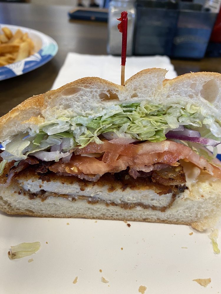 Talk Of The Towne Deli Logo