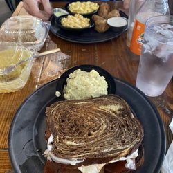 Imagine Vegan Cafe - Reuben sandwich with inedible potato salad. husband got wings and mac & cheese.