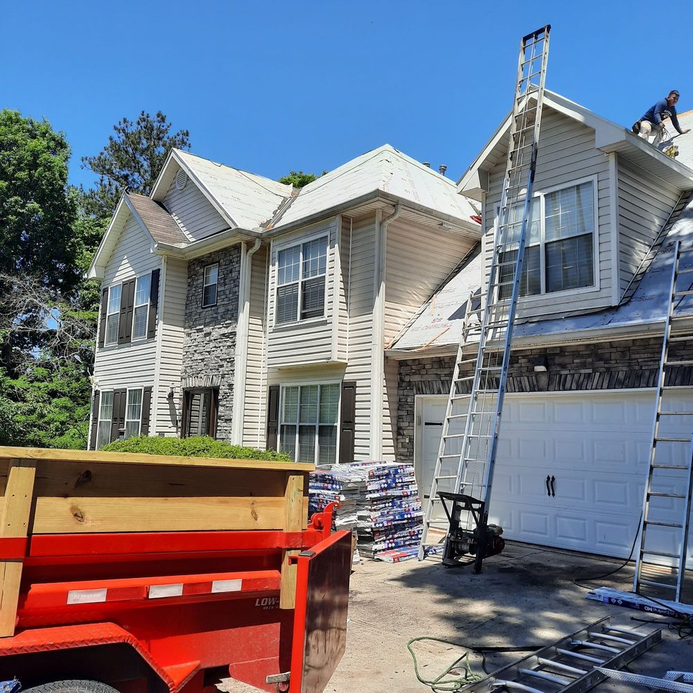 Slide of Arbra Roofing