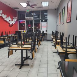Flame Broiler - Chairs up on tables.