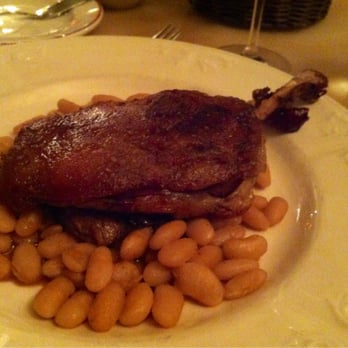 Petit Louis Bistro - Duck confit over legumes - French Near Me - Baltimore, Maryland