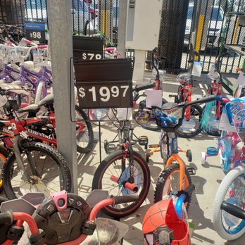 Walmart Supercenter - The false advertised bikes. I took that one right by the sign. Liars! - Department Stores Near Me - Sanger, California