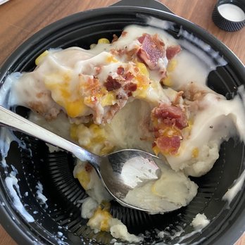 The Bird - a bowl of food with a spoon in it - Chicken Shop Near Me - Syracuse, Utah