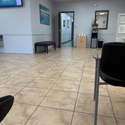Labcorp - These patients medical information is just being blasted into the lobby because she didn't shut the door.
