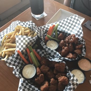 Wing House - Lemon pepper wet on the left and mango habanero on the right. Guinness and lemon pepper fries pictured as well. - Chicken Wings Near Me - South Gate, California Wing House - Lemon pepper wet on the left and mango habanero on the right. Guinness and lemon pepper fries pictured as well. - Chicken Wings Near Me - South Gate, California
