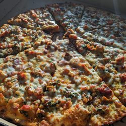 Curry Pizza - Butter Chicken Tikka Masala Pizza (with a bite because we got too excited to eat it)