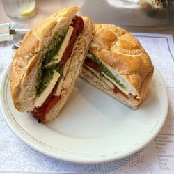Grilled chicken with mozzarella, red pepper with pesto. Very good!
