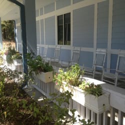 Dunnellon Public Library - Front porch with rocking chairs.